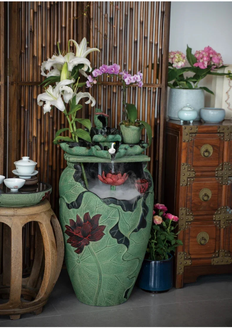 Chinese tea room layout, floor-to-ceiling running water ornament next to the TV cabinet in the living room, circulating water