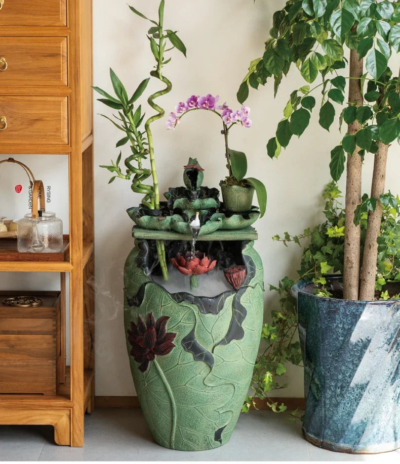 Chinese tea room layout, floor-to-ceiling running water ornament next to the TV cabinet in the living room, circulating water