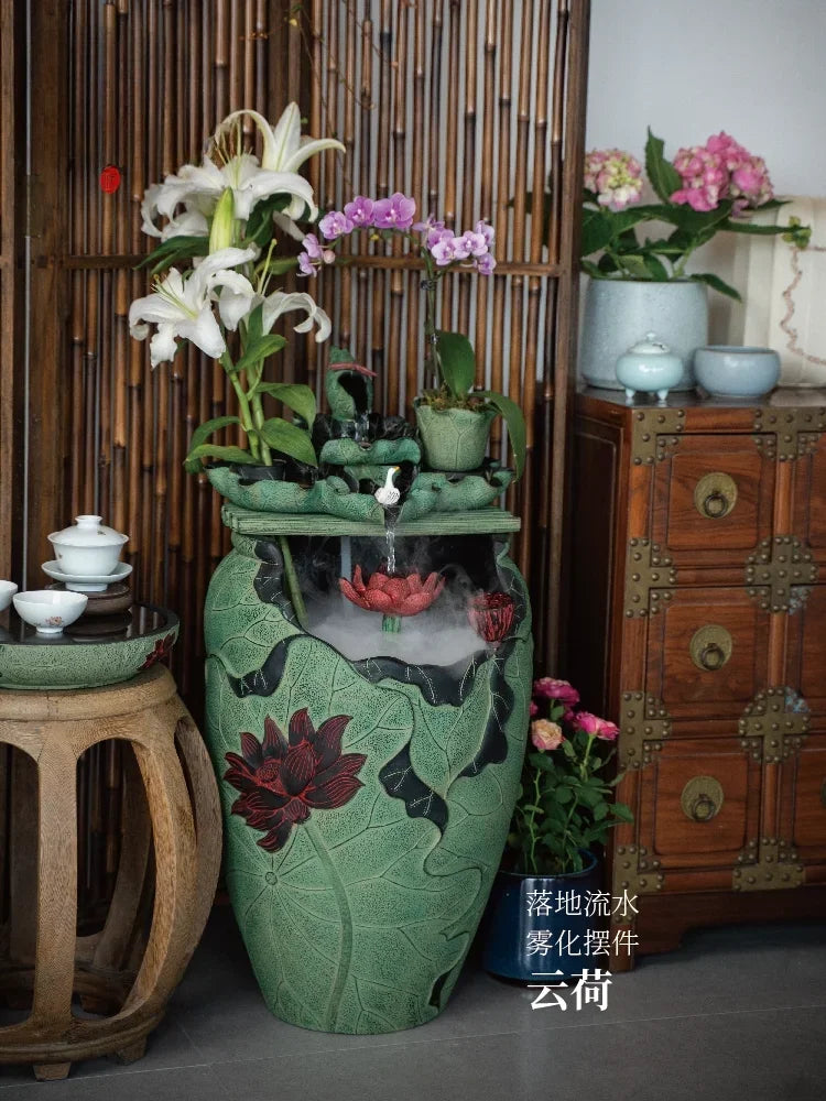 Chinese tea room layout, floor-to-ceiling running water ornament next to the TV cabinet in the living room, circulating water